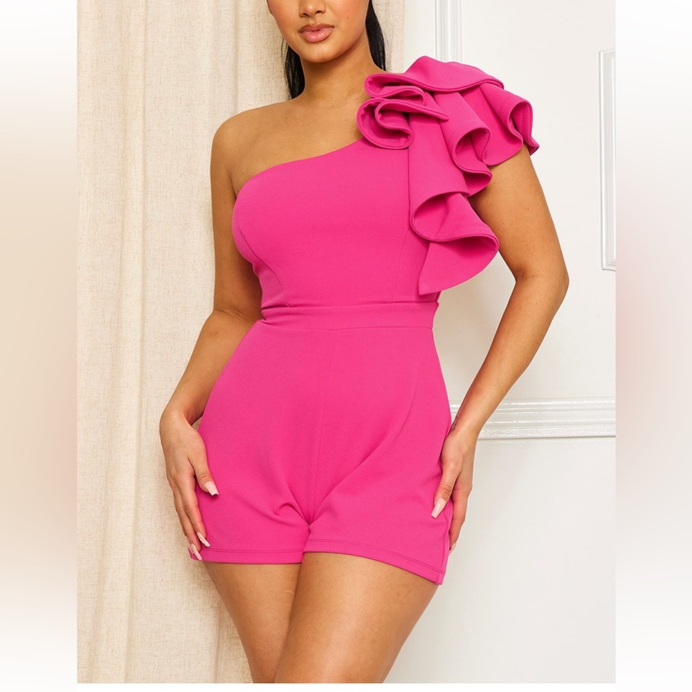 Beautiful one shoulder ruffled romper.